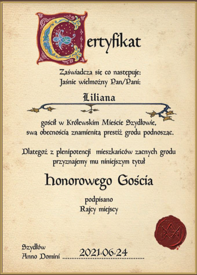 Certyfikat honorowego gościa, z pieczęcią i stylizowaną czczionką - atrakcja szydłowieckiego zamku.